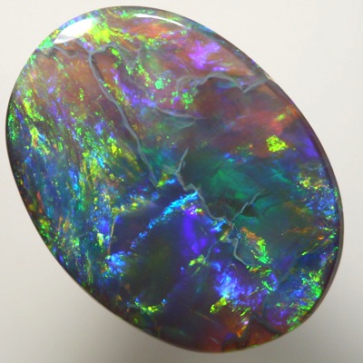SOLID BLACK OPAL Gem quality opal with bright Golden gemmy fire  SEE VIDEO